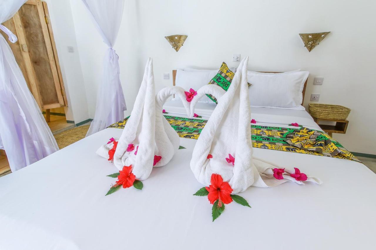 Natural Garden Boutique Hotel Джамбиани Экстерьер фото