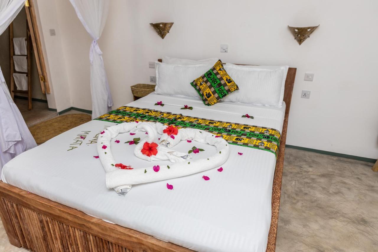 Natural Garden Boutique Hotel Джамбиани Экстерьер фото