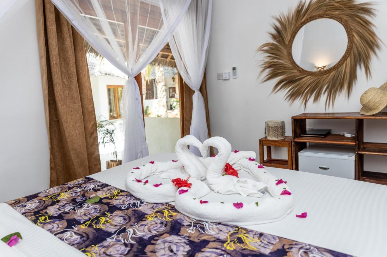 Natural Garden Boutique Hotel Джамбиани Экстерьер фото